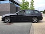 BMW 3-Serie Touring 330e Business Edition Plus I 293PK I Camera I Trekhaak I Ambiente I Full Led I Stoel & Stuurverw. I Half/Leder