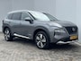 Nissan X-Trail 1.5 e-4orce Tekna 4WD 7p. Automaat / Trekhaak (Trekgewicht 1.650kg) / HUD / Stuur- en Stoelverwarming voor en achter / 360° Camera / Adaptieve Cruise Control / Elektrisch Verstelbare Bestuurdersstoel en Passagiersstoel met geheugenset / Climate Control / Keyless Entry & Start / Apple Carplay & Android Auto / Parkeersensoren voor + achter / Elektrische Achterklep / Navigatie full map