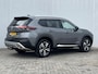 Nissan X-Trail 1.5 e-4orce Tekna 4WD 7p. Automaat / Trekhaak (Trekgewicht 1.650kg) / HUD / Stuur- en Stoelverwarming voor en achter / 360° Camera / Adaptieve Cruise Control / Elektrisch Verstelbare Bestuurdersstoel en Passagiersstoel met geheugenset / Climate Control / Keyless Entry & Start / Apple Carplay & Android Auto / Parkeersensoren voor + achter / Elektrische Achterklep / Navigatie full map