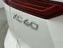 Volvo XC60 2.0 T8 Plug-in hybrid AWD Ultra Dark | CRYSTAL WHITE | Luchtvering | Trekhaak | Alarm | Extra getint glas | PDC + 360 camera | Stoel + Stuurverw |