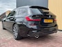 BMW 3-Serie Touring (g21) 330e 292pk xDrive M-Sport | Pano | Trekhaak | Laser | Memory | HUD | ACC | Stoel/Stuurverwarming | 360 Camera |