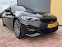 BMW 3-Serie Touring (g21) 330e 292pk xDrive M-Sport | Pano | Trekhaak | Laser | Memory | HUD | ACC | Stoel/Stuurverwarming | 360 Camera |