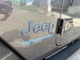 Jeep Wrangler Unlimited 4xe 380 PK Sahara | Schuifdak | Leder | Camera | Navi | 20"