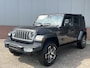 Jeep Wrangler Unlimited 4xe 380 PK Sahara | Schuifdak | Leder | Camera | Navi | 20"