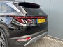 Hyundai Tucson 1.6 T-GDI 265pk PHEV Premium Sky 4WD | Leder | Carplay | Climate | Keyless | Navigatie | Elek. Klep | Full - Led | 360 Camera | KRELL Audio | Elek. Stoelen | 19" Lichtmetaal | Winterpakket | Stoelventilatie | Panoramadak | Dodehoek Detectie | Digitale Cockpit | Adapt. Cruisecontrol | Parkeer Assistent | 1e Eigenaar