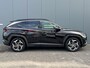 Hyundai Tucson 1.6 T-GDI 265pk PHEV Premium Sky 4WD | Leder | Carplay | Climate | Keyless | Navigatie | Elek. Klep | Full - Led | 360 Camera | KRELL Audio | Elek. Stoelen | 19" Lichtmetaal | Winterpakket | Stoelventilatie | Panoramadak | Dodehoek Detectie | Digitale Cockpit | Adapt. Cruisecontrol | Parkeer Assistent | 1e Eigenaar