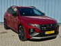 Hyundai Tucson 1.6 T-GDI PHEV N Line 4WD Sunset Red | 4 x 4 | Airco AUTO | Cruise Control Adaptive | Stoelverwarming | 1.350KG trekvermogen