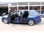 Opel Astra Sports Tourer 1.4 Elegance automaat. 146pk, Navigatie, set winterwielen!