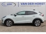 Ford Puma 1.0-125 pk EcoBoost Mild-Hybrid Titanium. Nieuw Model ! Fabrieksgarantie t/m 26-03-2029 ! Slechts 4.900km ! Stoel-, stuur- en voorraamverwarming, Side- en Lane assist, Adaptieve cruise control, Trekhaak afneembaar, LM wielen, Navigatie, telefoonvoorb.