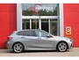 BMW 1-Serie 118i 136PK INTRODUCTION EDITION M-SPORT | PANORAMISCH SCHUIF/KANTEL DAK | SHADOW LINE PAKKET | SFEER VERLICHTING | LEDEREN BEKLEDING "DAKOTA GEPERFOREERD" | ACHTERUITRIJ CAMERA | PARKEERSENSOREN VOOR EN ACHTER | ALARM | STOEL VERWARMING | DRAADLOZE APPLE CARPLAY/ANDROID AUTO | LICHTMETALEN VELGEN 17" | LANE ASSIST | DAB+ RADIO | SPORT STOELEN | WARMTE WEREND GLAS | BMW LIVE COCKPIT PROFESSIONAL |