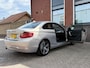 BMW 2-Serie Coupé 220i Executive | AUTOMAAT | PANO | NAVI | PDC | TREKHAAK |