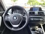 BMW 1-Serie 114i EDE | Met o.a. navigatie, cruise control, armsteun, airco en in goede staat!