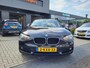 BMW 1-Serie 114i EDE | Met o.a. navigatie, cruise control, armsteun, airco en in goede staat!