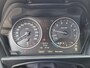 BMW 1-Serie 114i EDE | Met o.a. navigatie, cruise control, armsteun, airco en in goede staat!