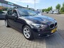 BMW 1-Serie 114i EDE | Met o.a. navigatie, cruise control, armsteun, airco en in goede staat!