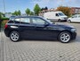 BMW 1-Serie 114i EDE | Met o.a. navigatie, cruise control, armsteun, airco en in goede staat!