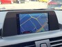BMW 1-Serie 114i EDE | Met o.a. navigatie, cruise control, armsteun, airco en in goede staat!