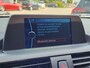 BMW 1-Serie 114i EDE | Met o.a. navigatie, cruise control, armsteun, airco en in goede staat!