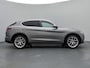 Alfa Romeo Stelvio First Edition 280 pk Automaat | Navigatie | Achteruitrijcamera | Lederen Bekleding | Voorstoelen Verwarmd | Bi-Xenon Koplampen | Keyless Entry/Start | Dodehoek Detectie | Premium Audio | 20" Lichtmetalen Velgen | Apple Carplay/Android Auto |