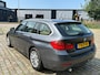 BMW 3-Serie Touring 320i High Executive 2e eigenaar dealer onderhouden navigatie leerbekeleding stoelverwarming cruis control