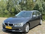 BMW 3-Serie Touring 320i High Executive 2e eigenaar dealer onderhouden navigatie leerbekeleding stoelverwarming cruis control
