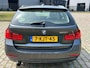 BMW 3-Serie Touring 320i High Executive 2e eigenaar dealer onderhouden navigatie leerbekeleding stoelverwarming cruis control