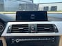 BMW 3-Serie Touring 320i High Executive 2e eigenaar dealer onderhouden navigatie leerbekeleding stoelverwarming cruis control