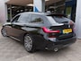 BMW 3-Serie Touring 320i 184pk Automaat High Executive M-Sport | Navi | Apple Carplay+Android Auto | Adap.Cruise | Leder+Alcantara | Led Koplampen | Sfeerverlichting | Stoelverwarming | Pdc V+A+Camera | 18''lm