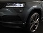Skoda Karoq 1.5 TSI ACT Sportline Business 150 pk Automaat (DSG) | Navigatie | Elektr. trekhaak | Parkeersensoren | Achteruitrijcamera | Adaptieve cruise control | Stoelverwarming |