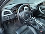 BMW 3-Serie 316i Upgrade Edition136PK Navigatie / Xenon / Lederen Bekleding / Stoelverwarming / Cruise Controle / Blouthoot / Park