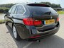 BMW 3-Serie Touring 320i High Executive