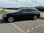 BMW 3-Serie Touring 320i High Executive