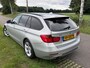 BMW 3-Serie 318d Touring  AUT. / SPORTLINE / LEDER / NAVI / XENON / TREKHAAK