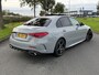 Mercedes-Benz C-klasse 180 Business Solution AMG | Panoramadak | Sportstoelen | Digital Light | 360 Camera | DAB | Ele.wegklapbare Trekhaak | Sfeerverlichting | Nightpakket | Spiegelpakket | Apple Carplay/Android Auto |