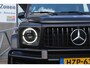 Mercedes-Benz G-klasse 63 AMG Manufaktur/Night pakket/Magno matt/Panoramadak/Burmester/Sfeerverlichting/Entertainment schermen/Akrapović/AMG active ride control/Elektrisch verstelbare stoelen met memory + massage/Stoel verwarming + koeling/360° camera/voorruitverwarming/IWC/Ala