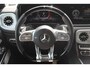 Mercedes-Benz G-klasse 63 AMG Manufaktur/Night pakket/Magno matt/Panoramadak/Burmester/Sfeerverlichting/Entertainment schermen/Akrapović/AMG active ride control/Elektrisch verstelbare stoelen met memory + massage/Stoel verwarming + koeling/360° camera/voorruitverwarming/IWC/Ala