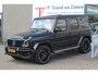 Mercedes-Benz G-klasse 63 AMG Manufaktur/Night pakket/Magno matt/Panoramadak/Burmester/Sfeerverlichting/Entertainment schermen/Akrapović/AMG active ride control/Elektrisch verstelbare stoelen met memory + massage/Stoel verwarming + koeling/360° camera/voorruitverwarming/IWC/Ala
