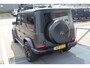 Mercedes-Benz G-klasse 63 AMG Manufaktur/Night pakket/Magno matt/Panoramadak/Burmester/Sfeerverlichting/Entertainment schermen/Akrapović/AMG active ride control/Elektrisch verstelbare stoelen met memory + massage/Stoel verwarming + koeling/360° camera/voorruitverwarming/IWC/Ala