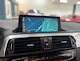 BMW 1-Serie 118i High Executive / AUTOMAAT / SCHUIFKANTELDAK / MULTIEMEDIA-NAVI