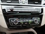 BMW X1 sDrive20i Sportline Automaat 192pk | Trekhaak Afneembaar | Panodak | Head Up | Lederen Sportstoelen Verwarmd | Navigatie | Camera | Sfeerverlichting | Virtual  | DAB |
