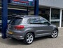 Volkswagen Tiguan 1.4 TSI Sport&Style R-line Edition / NL-Auto / Open-Panodak / Cruise-Control / Alcantara / Bi-Xenon / Armsteun-Voor / Radio-Bluetooth / Navi / Elektr.-Pakket / PDC V+A / 18'' LMV / ENZ.