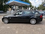 BMW 3-Serie Touring 318i Business Line *STOELVERW.*CLIMA*PANO*CRUISE*NAVI*PDC*TREKHAAK*