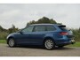 SEAT Leon ST 1.6 TDI Ecomotive Sport 145PK | Apollo Blue | Carplay/Cruise/Clima/Trekhaak/Stage 1 - 100& onderhouden!