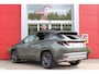 Hyundai Tucson 1.6 T-GDI PHEV 252PK 20TH ANNIVERSARY+SKY *NIEUW* | PANORAMISCH SCHUIF/KANTELDAK | STUUR / STOELVERWARMING | FULL LED KOPLAMPEN | HALF ALCANTARA / LEDER 20TH ANNIVERSARY DESIGN MET GROENE STIKSELS | NAVIGATIE | ADAPTIVE CRUISE CONTROL | DRAADLOOS APPLE CARPLAY / ANDROID AUTO | DRAADLOOS TELEFOONLADER | ELEKTRISCH BEDIENBARE ACHTERKLEP | DODEHOEK DETECTIE | 3 FASE CLIMATE CONTROL | KRELL PREMIUM AUDIO | 19"INCH 20TH ANNIVERSARY VELGEN | ZONWERING IN ACHTER PORTIEREN | PINE GREEN MATTE METALLIC LAK | DEURLIJSTEN MET LUXE AFWERKING | DAKRAILS ZWART |