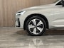 Volvo XC60 T6 AWD Recharge Plus Dark | Trekhaak | 360° Camera | All Season banden | Adaptieve Cruise Control | Stoelverwarming voor+achter | Stuurwielverwarming | Pilot Assist | BLIS Dode Hoek Detectie | Elektrische voorstoelen geheugen | Lederen bekleding | Zitting