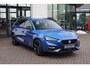SEAT Leon Sportstourer 1.5 TSI e-Hybrid FR Business 204PK / 150kW, Achteruitrijcamera, 3-zone Climatronic, Apple Carplay & Android Auto, dodehoeksensor, adaptive cruise control, grootlichtassistent, keyless start, volledig digitaal instrumentenpaneel (Virtual Cockpit), black pack (18'' LMV zwart, spiegelkappen. achterspoiler & sideskirts uitgevoerd in zwart), parkeersensoren voor & achter (pdc)