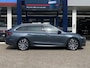 Skoda Octavia Combi 1.0 TSI Business Edition Plus / NL-Auto / Adaptieve Cruise-Control / Stoelverwarming / Trekhaak / Apple-Carplay & Android-Auto / Dodehoek-Detectie / Draadloze-Lader / Elektr.-Achterklep / Climate-Control / Keyless / LED / DAB Radio-Bluetooth / Navi / Armsteun V+A / PDC V+A / 18'' LMV /