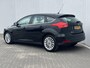 Ford Focus 1.0 Titanium / Navigatie full map / Cruise- en Climate Control / Parkeersensoren voor en achter / Keyless Start / Verwarmde Voorruit / Bluetooth / Radio / All Season Banden