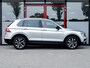 Volkswagen Tiguan 1.5 TSI IQ Drive | Navigatie | Camera | Climate Control | Adaptieve Cruise Control | Parkeersensoren | DAB+ Radio | 17'' Lichtmetalen Velgen | Metallic Lak | Privacy Glas | Dode Hoek Detectie | Apple Carplay | Android Auto |