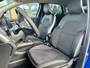 Renault Captur 1.0 TCe 90 Techno | Groot Scherm | Stoel+Stuur+Voorruit Verwarming | All Seasons | Draadloze Telefoonlader | Camera+Parkeersensoren | Navigatie | Dakrails | Climate Control | Two-Tone | Lichtmetaal | Apple Car